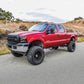 Westin 1999-2016 Ford F-250/F-350/F-450/F-550 Crew Cab Outlaw Drop Nerf Step Bars Textured Black