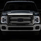 Raxiom 11-16 Ford F-250 Super Duty LED Projector Headlights - Chrome Housing (Clear Lens)