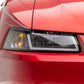 Raxiom 99-04 Ford Mustang Axial Series Headlights w/ Sequential LED Bar- Black Housing (Clear Lens)