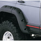 Bushwacker 84-01 Jeep Cherokee Cutout Style Flares 4pc Fits 4-Door Sport Utility Only - Black
