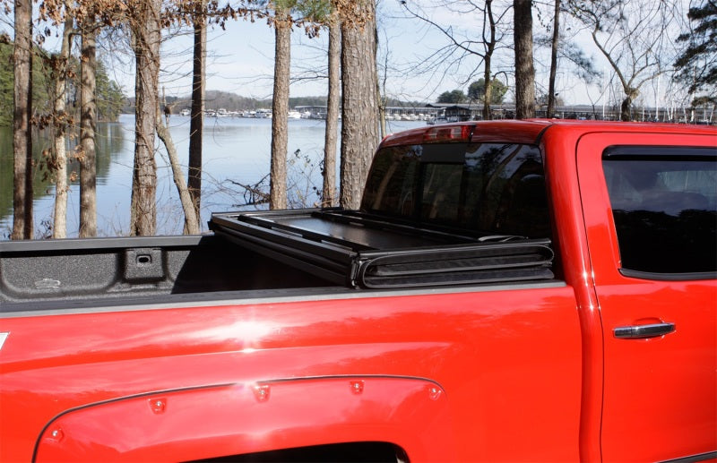 Lund 15-17 Chevy Colorado Fleetside (6ft. Bed) Hard Fold Tonneau Cover - Black