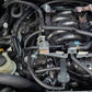 J&amp;L 16-24 Nissan Titan 5.6L Passenger Side Oil Separator 3.0 - Black Anodized