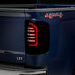 Raxiom 14-18 Chevrolet Silverado 1500 Axial Series LED Tail Lights- Black Housing (Smoked Lens)