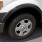 Lund 09-14 Ford F-150 (Ex Raptor) SX-Sport Style Textured Elite Series Fender Flares - Black (4 Pc.)