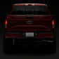 Raxiom 07-14 Ford F-150 Axial Series LED License Plate Lamps- Smoked