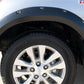 Lund 07-13 Toyota Tundra RX-Rivet Style Textured Elite Series Fender Flares - Black (4 Pc.)